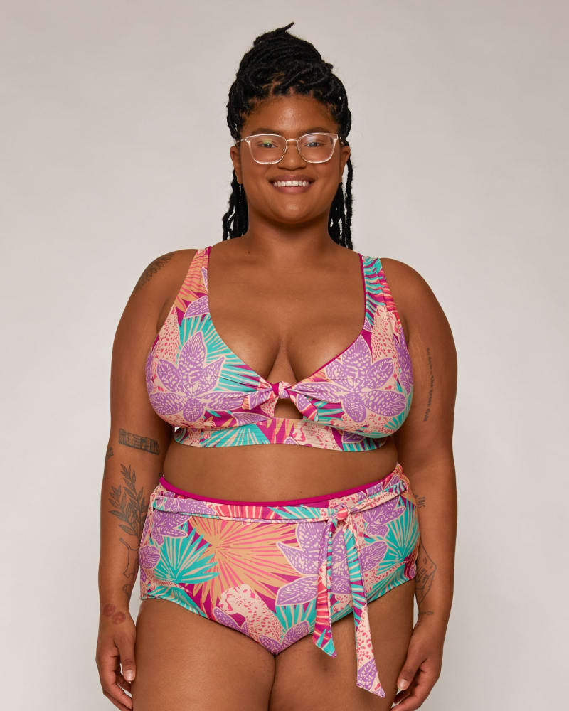 Front of a model wearing a size 10|12 Hana High-Waisted Bikini Bottoms in Orchid/Rio by Wild Isles Swim. | dia_product_style_image_id:284875